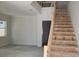 Living room with an open staircase at 3707 W San Juan St, Tampa, FL 33629