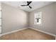 Simple bedroom with hardwood floors and a window at 5018 Elm Leaf Dr, Brooksville, FL 34601