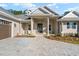 Columns and stone accents grace the entrance of this house at 5018 Elm Leaf Dr, Brooksville, FL 34601