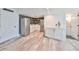 Basement bar with wet bar, refrigerator, and ample storage at 4334 Sanddollar Ct, New Port Richey, FL 34652