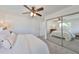 Primary bedroom with large mirrored closet and en-suite bathroom at 4334 Sanddollar Ct, New Port Richey, FL 34652