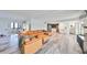 Expansive living area with sectional sofa, wet bar and home office at 4334 Sanddollar Ct, New Port Richey, FL 34652