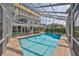 Large pool and spa with screened enclosure at 4334 Sanddollar Ct, New Port Richey, FL 34652
