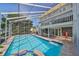 Inviting pool with spa and screened enclosure, perfect for relaxation at 4334 Sanddollar Ct, New Port Richey, FL 34652