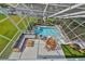 Elevated pool deck with spa, seating, fire pit, and outdoor kitchen at 4334 Sanddollar Ct, New Port Richey, FL 34652