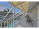 Relaxing upper balcony overlooking the pool and backyard at 4334 Sanddollar Ct, New Port Richey, FL 34652