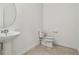 Simple bathroom with pedestal sink and toilet at 12733 Wanderlust Pl, Parrish, FL 34219