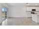 Bright dining area with sliding glass doors to backyard at 12733 Wanderlust Pl, Parrish, FL 34219