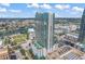 Aerial view of a modern high-rise building with city views and pool at 777 N Ashley Dr # 1516, Tampa, FL 33602