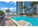 Inviting rooftop pool with plenty of lounge chairs for relaxation at 777 N Ashley Dr # 1516, Tampa, FL 33602