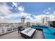 Relaxing rooftop terrace with fire pit and seating at 777 N Ashley Dr # 1516, Tampa, FL 33602