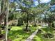 Lush landscaping surrounds a pond with fountain in this community at 315 30Th W Ave # B207, Bradenton, FL 34205