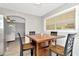View of dining area from kitchen, showing table and chairs at 6921 Onyx N Dr, St Petersburg, FL 33702