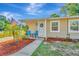 Landscaped front yard with walkway to the front door at 6921 Onyx N Dr, St Petersburg, FL 33702