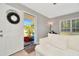 Living room with white couch and light grey walls at 6921 Onyx N Dr, St Petersburg, FL 33702