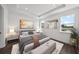 Main bedroom with plush bed and lake view at 3778 Maxwell Park Dr, Sun City Center, FL 33573