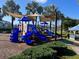 playground with slides and shade structures at 5239 Admiral Pointe Dr, Apollo Beach, FL 33572