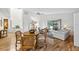 Dining area with hardwood floors, a round table, and wicker chairs at 20 Summerwinds Ln, Oldsmar, FL 34677