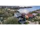 Beautiful aerial view of a modern two-story home on a waterfront property with bay access at 5006 W San Miguel St, Tampa, FL 33629