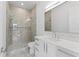 Clean bathroom with large shower and white countertops at 5006 W San Miguel St, Tampa, FL 33629
