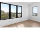 Bedroom showcasing the water view with natural light streaming through the windows at 5006 W San Miguel St, Tampa, FL 33629