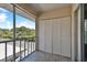 Relaxing balcony featuring a storage closet and offering a view of lush greenery and neighborhood at 8693 Bardmoor Blvd # 308B, Seminole, FL 33777