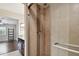 Bathroom with tiled shower and granite countertop vanity at 8693 Bardmoor Blvd # 308B, Seminole, FL 33777