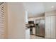 Bright kitchen featuring white cabinetry, stainless steel appliances, and ample storage at 8693 Bardmoor Blvd # 308B, Seminole, FL 33777