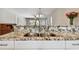 Stylish kitchen sink with granite countertops and stainless steel fixtures at 8693 Bardmoor Blvd # 308B, Seminole, FL 33777