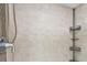 Detailed shot of tiled shower with chrome fixtures at 8693 Bardmoor Blvd # 308B, Seminole, FL 33777
