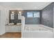 Spa-like bathroom with double vanity and a large soaking tub at 212 S Moody Ave # 2, Tampa, FL 33609