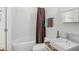 Simple bathroom with shower/tub combo and white tile at 212 S Moody Ave # 2, Tampa, FL 33609