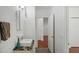 Clean bathroom with granite vanity, sink, and toilet at 212 S Moody Ave # 2, Tampa, FL 33609