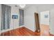 Bright bedroom with hardwood floors and neutral walls at 212 S Moody Ave # 2, Tampa, FL 33609