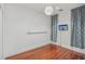 Bright bedroom with hardwood floors and neutral walls at 212 S Moody Ave # 2, Tampa, FL 33609