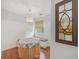 Cozy dining area with built-in bench seating and round table at 212 S Moody Ave # 2, Tampa, FL 33609