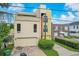 Modern three-story home with attached garage and landscaped yard at 212 S Moody Ave # 2, Tampa, FL 33609