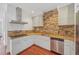Modern kitchen with stainless steel appliances and granite countertops at 212 S Moody Ave # 2, Tampa, FL 33609
