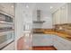 Modern kitchen with stainless steel appliances and granite countertops at 212 S Moody Ave # 2, Tampa, FL 33609