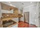 Modern kitchen with stainless steel appliances and granite countertops at 212 S Moody Ave # 2, Tampa, FL 33609