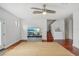 Light-filled living room with hardwood floors and a large area rug at 212 S Moody Ave # 2, Tampa, FL 33609