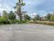 Paved basketball court with markings and a hoop at 11818 Tetrafin Dr, Riverview, FL 33579