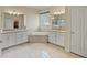 Spacious bathroom boasting double vanities, a corner tub, and ample storage at 11818 Tetrafin Dr, Riverview, FL 33579
