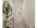 Bright and spacious entryway with wood-look floors at 11818 Tetrafin Dr, Riverview, FL 33579