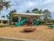 playground with shade structure, playset, and spinner at 11818 Tetrafin Dr, Riverview, FL 33579