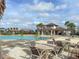 Inviting community pool with tables and chairs at 11818 Tetrafin Dr, Riverview, FL 33579