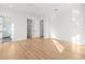 Bright bedroom with hardwood floors and access to a private bathroom at 3011 W Asbury Pl, Tampa, FL 33611