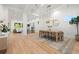 Elegant dining room featuring a large wooden table and chandelier at 3011 W Asbury Pl, Tampa, FL 33611