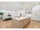 Modern kitchen with a large island and stainless steel appliances at 3011 W Asbury Pl, Tampa, FL 33611