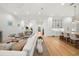 Bright living room with an open floor plan and kitchen access at 3011 W Asbury Pl, Tampa, FL 33611